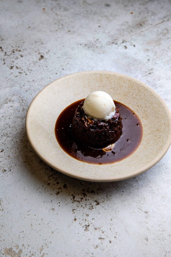 Christmas pudding with ice cream and rum pairing