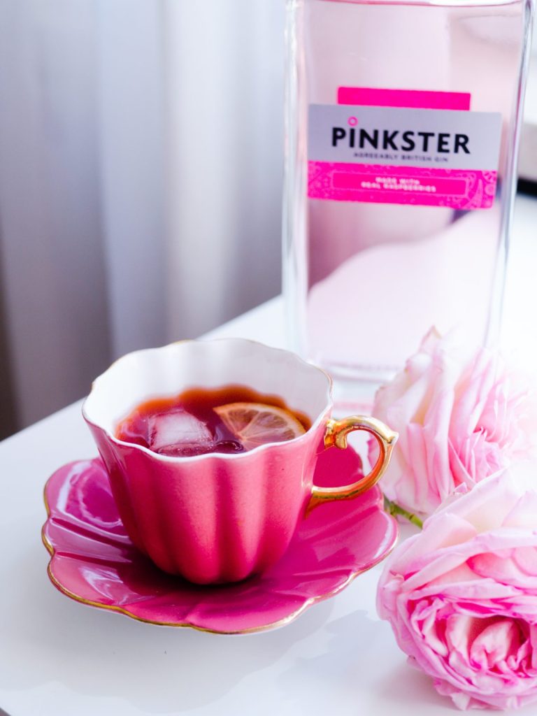 Pinkster Gin cocktail in a tea cup