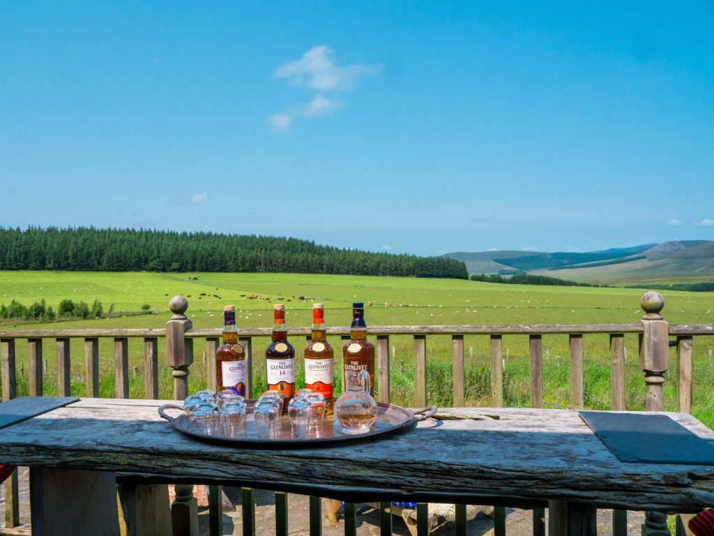 The Glenlivet whisky bottles with a view