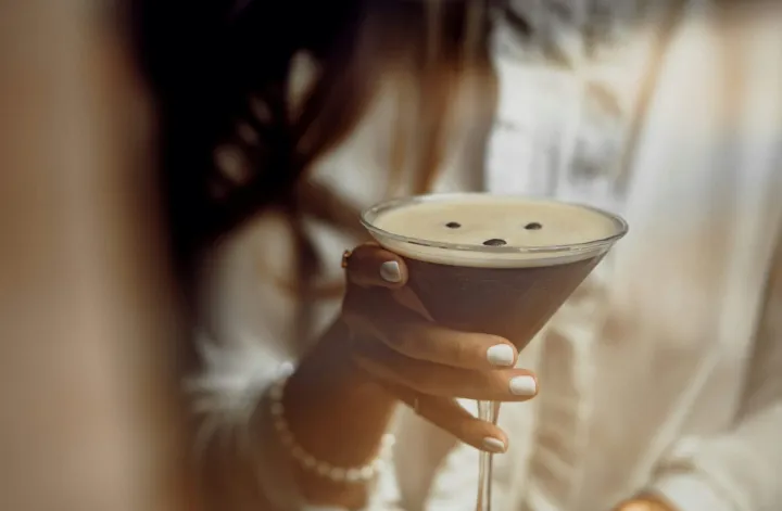 Women holding an espresso martini