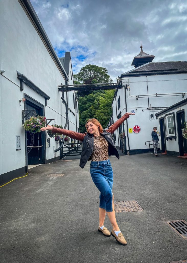 Inka Larissa outside a distillery