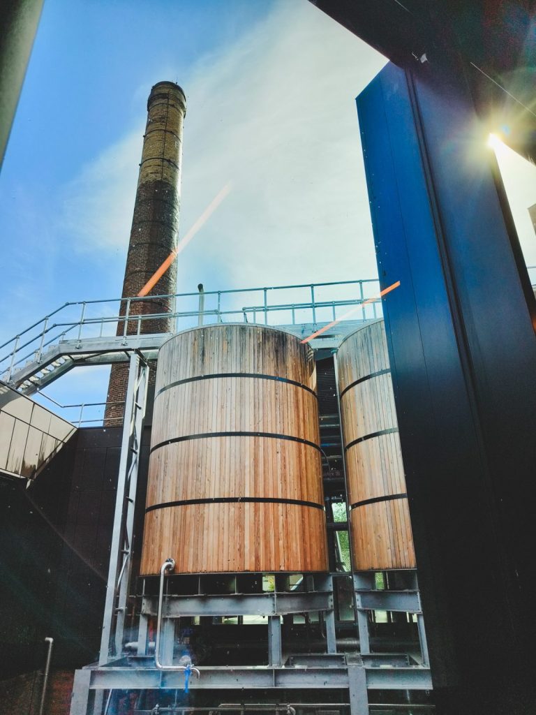 Rosebank chimney stack and worm tubs through a window