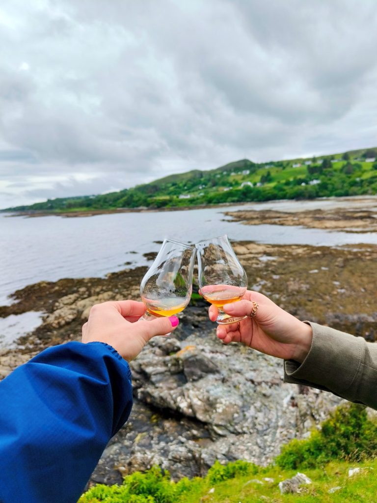 Whisky drams at Caisteal Chamuis ruins in Isle of Skye