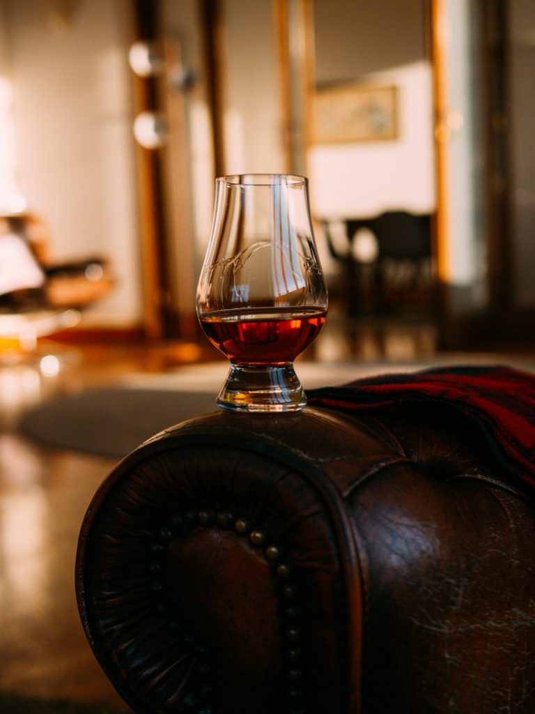 whisky glass in an evening light