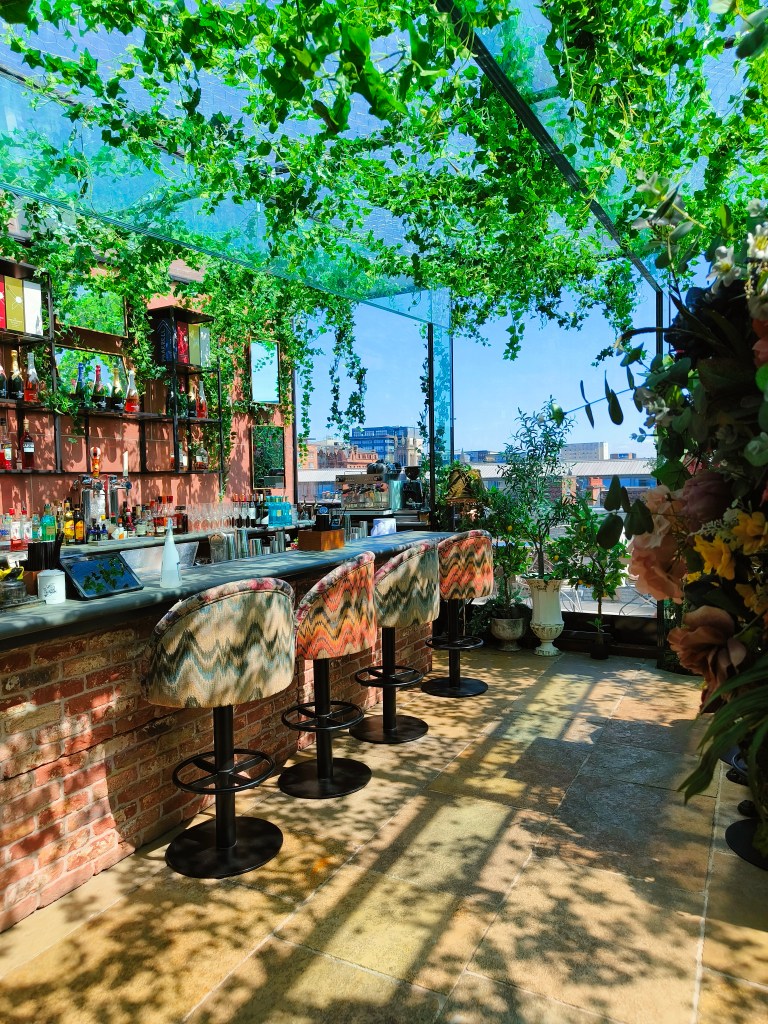 House of Gods roof top bar with flower decor