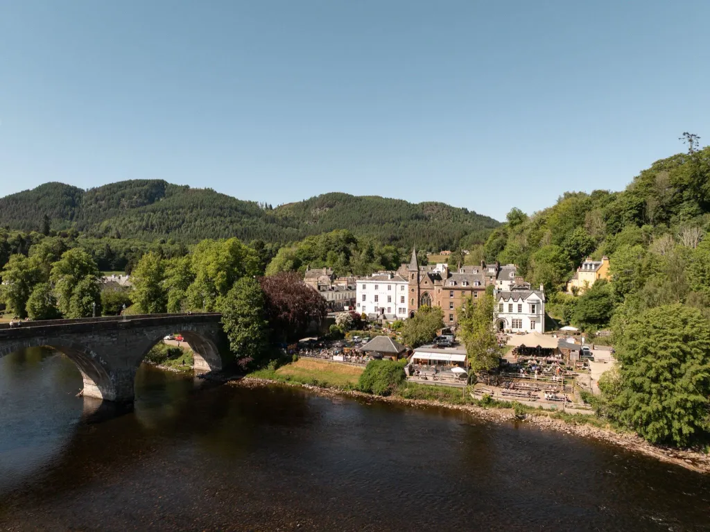 skyview of The Taybank and their beer gardens right by the river with green all around