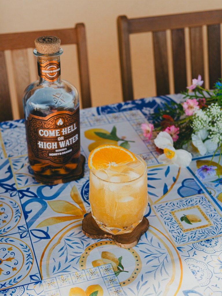 A glass of rum punch at a bbq